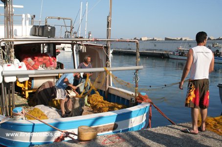 To visit Agia Galini the fishermen clean nets