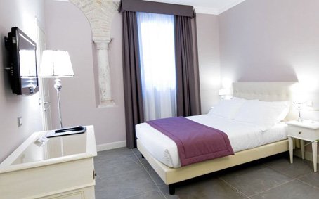 Hôtel Palazzo dei Mercanti une des chambres